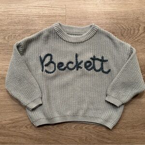 “Beckett” name sweater